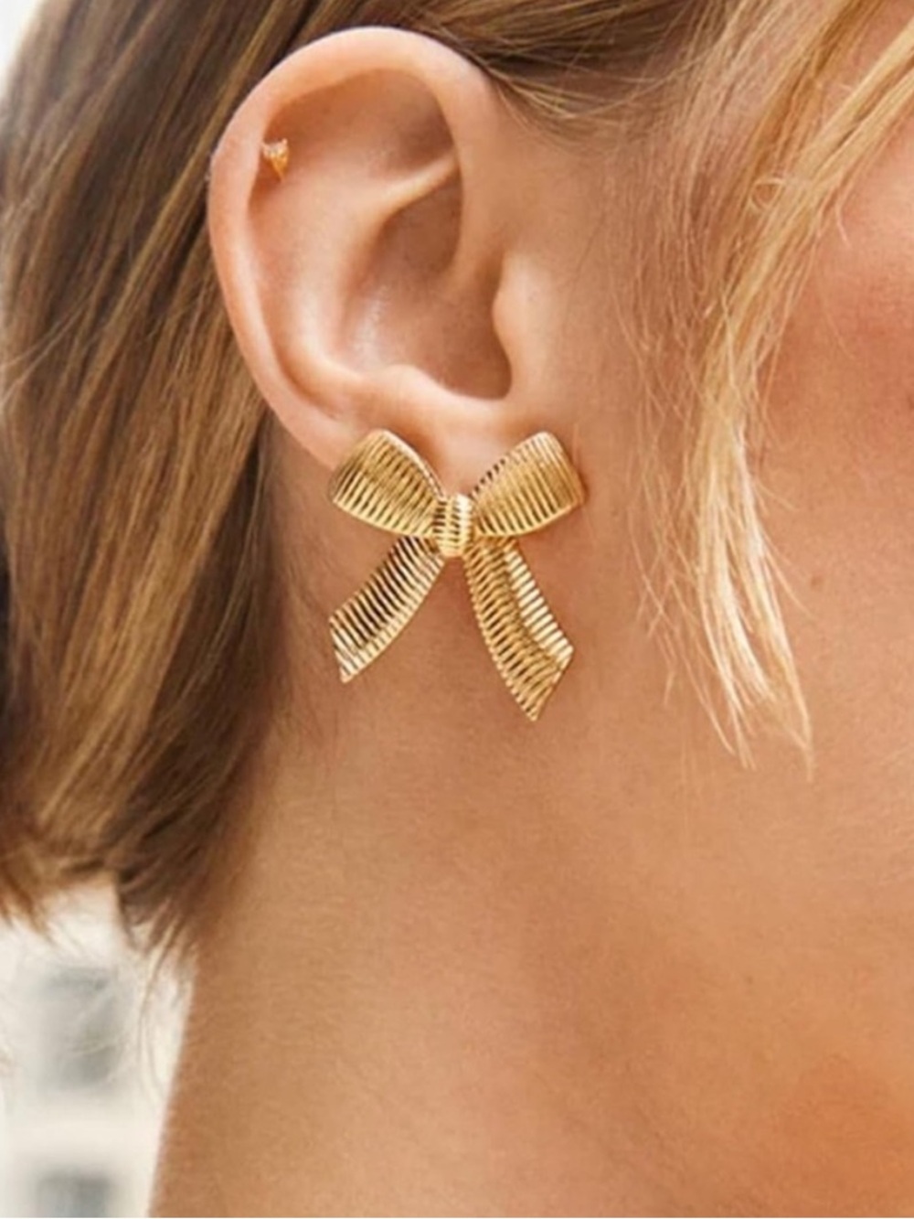 Anthropologie Ribbed Bow Drop Earrings - Gold Tone